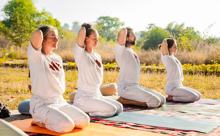 Arhanta Yoga students practice breathwork and meditation training at an intensive yoga teacher training course in India 