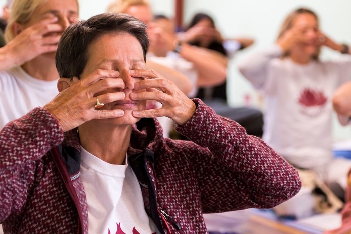 Yoga practitioners practice Bhramari Pranayama for stress relief
