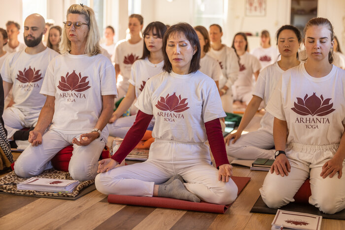 Yoga students learn how tp remove the ego in meditation Yoga students learn how tp remove the ego in meditation