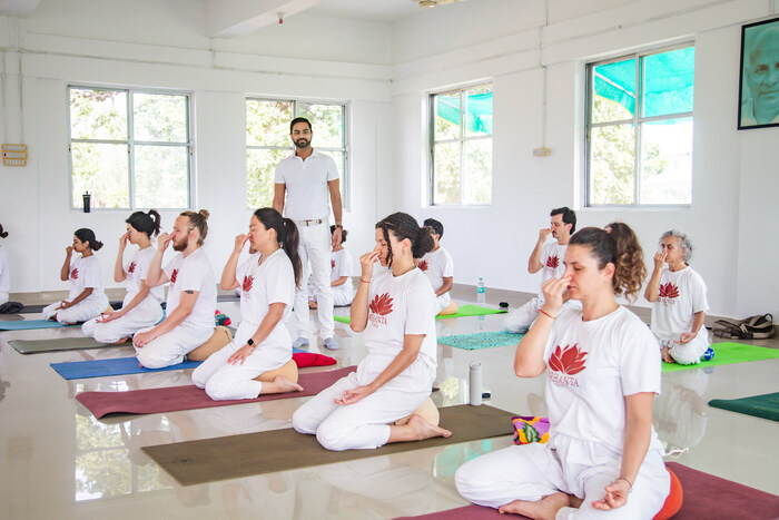 Yoga students practice pranayama on a 200-hour yoga teacher training Yoga students practice pranayama on a 200-hour yoga teacher training