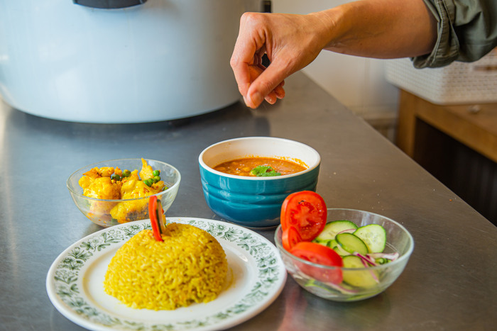 A chef prepares healthy ashram food A chef prepares healthy ashram food