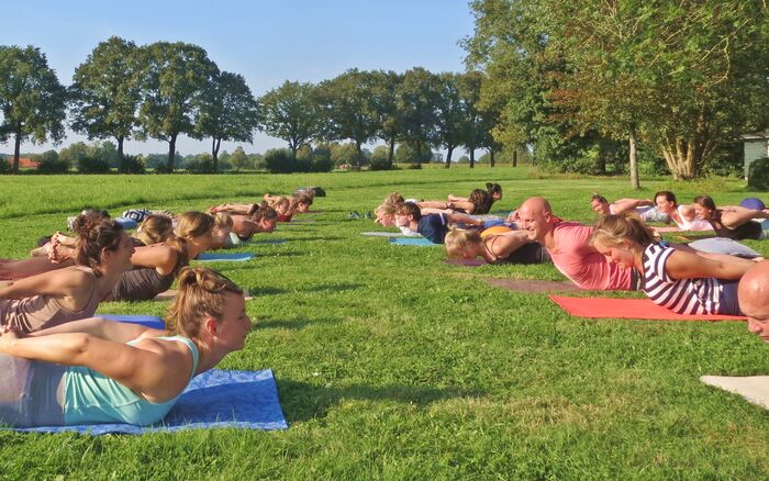Locust pose practice session outdoor