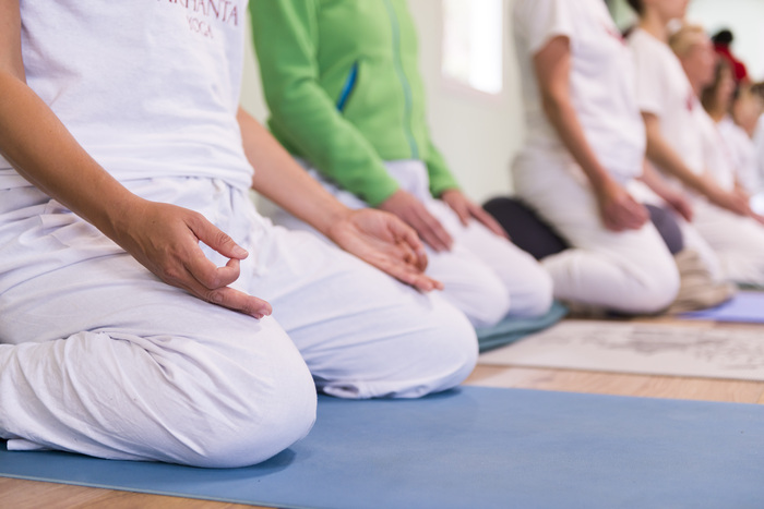 Yoga students practice gentle yoga Yoga students practice gentle yoga