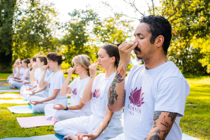Man practices pranayama for mental health Man practices pranayama for mental health