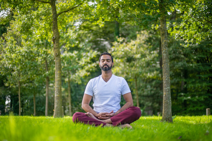 Seated mediation posture commonly known as easy pose Seated mediation posture commonly known as easy pose