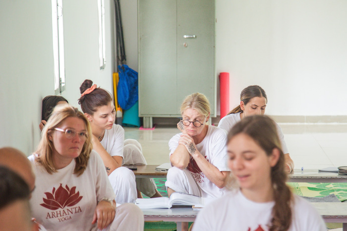 Students learning yoga philosophy at ashram