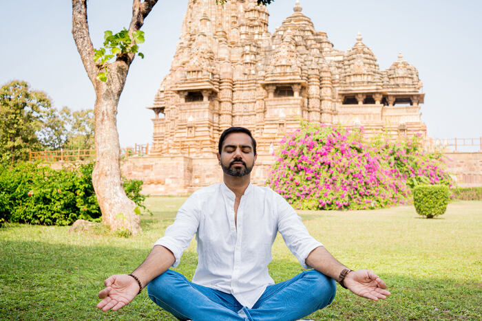 Seated in Padmasana also known as Lotus pose Seated in Padmasana also known as Lotus pose