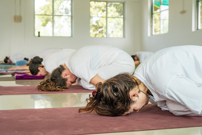 Students in Balasana or child pose