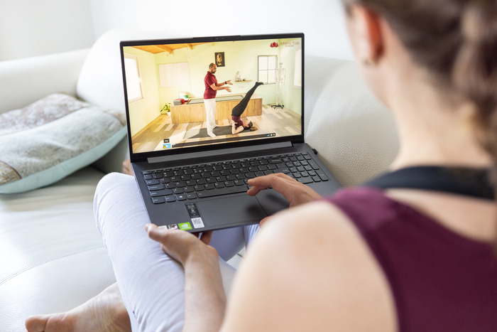Yoga student attending online yoga classes 